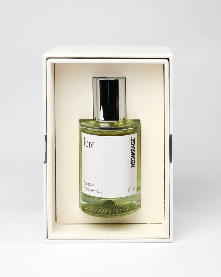 Perfume bottle and packaging labeled 'lore' by 'Neomirage' on a white background