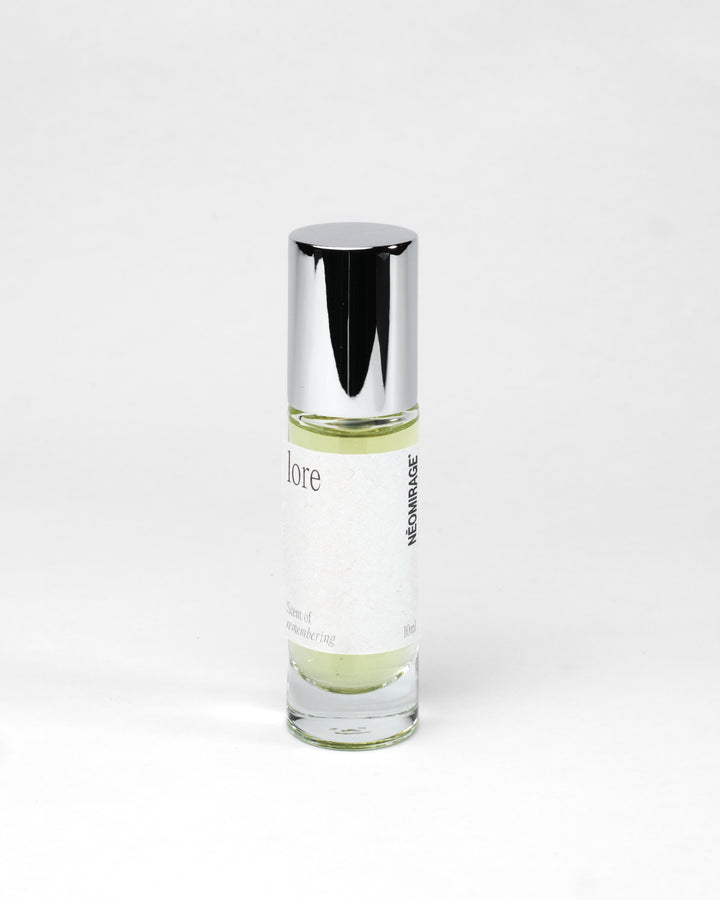 Perfume bottle labeled 'lore' by 'Neomirage' on a white background