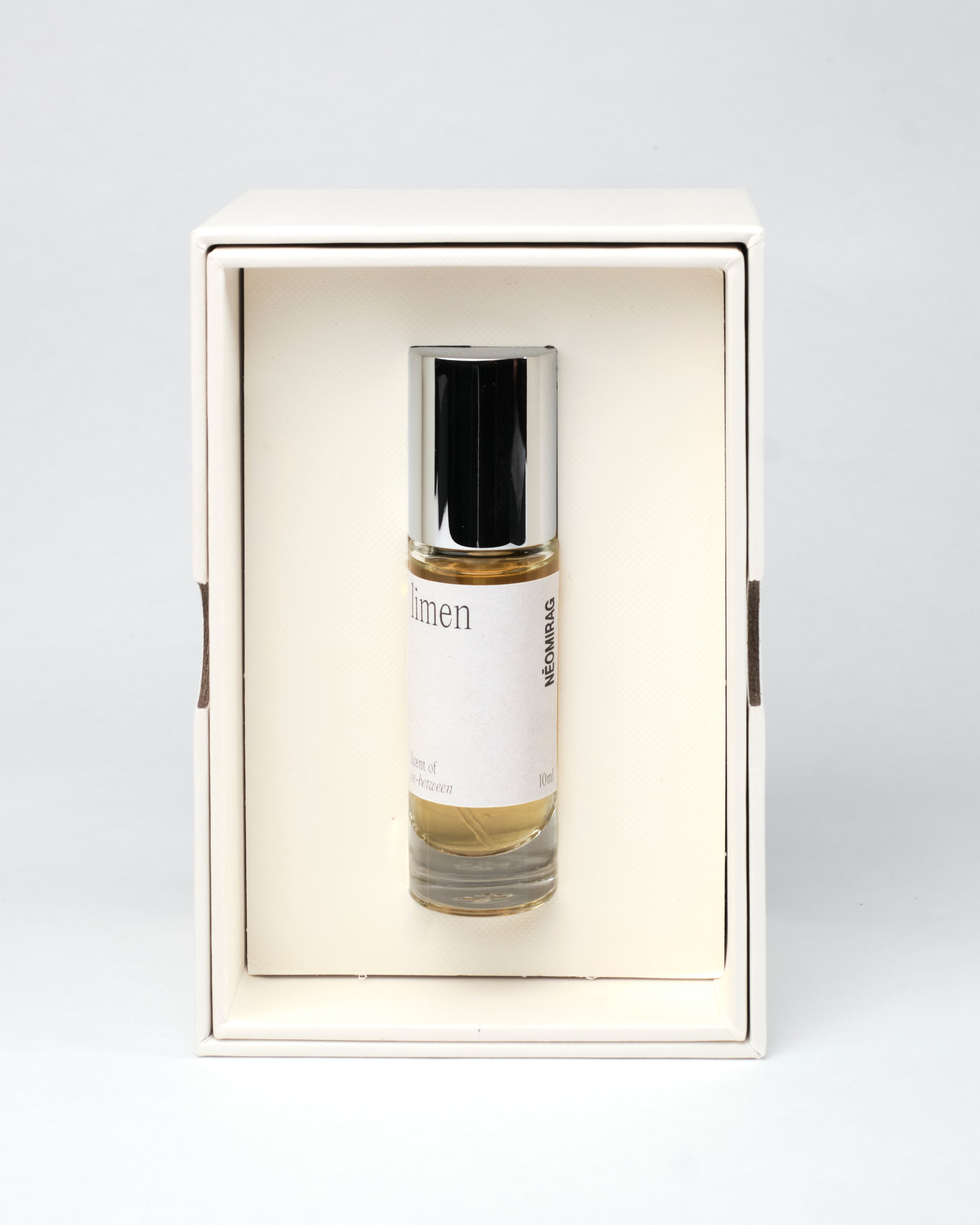 Néomirage limen perfume 10ml bottle and packaging on a white background